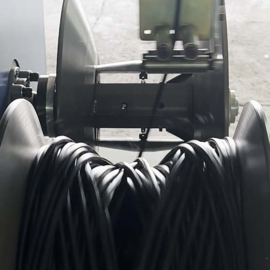 DOSING LAUNCHES DUAL-AXIS PLC FIGURE-8 COILING MACHINE WITH AUTO-GUARD RING SYST